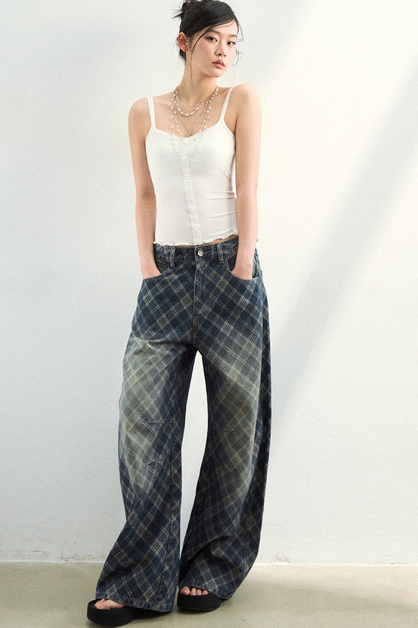 Pantaloni in denim a quadri sfumati