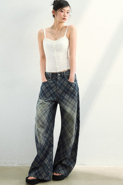Pantaloni in denim a quadri sfumati