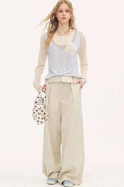 Pantalon droit à rayures et empiècements