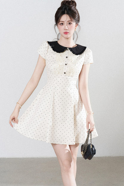 Robe trapèze à pois avec col Claudine