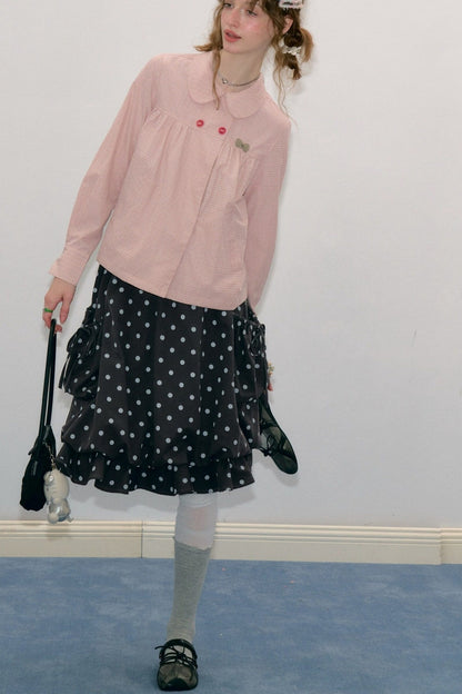 Gonna midi a pois a vita alta con volant