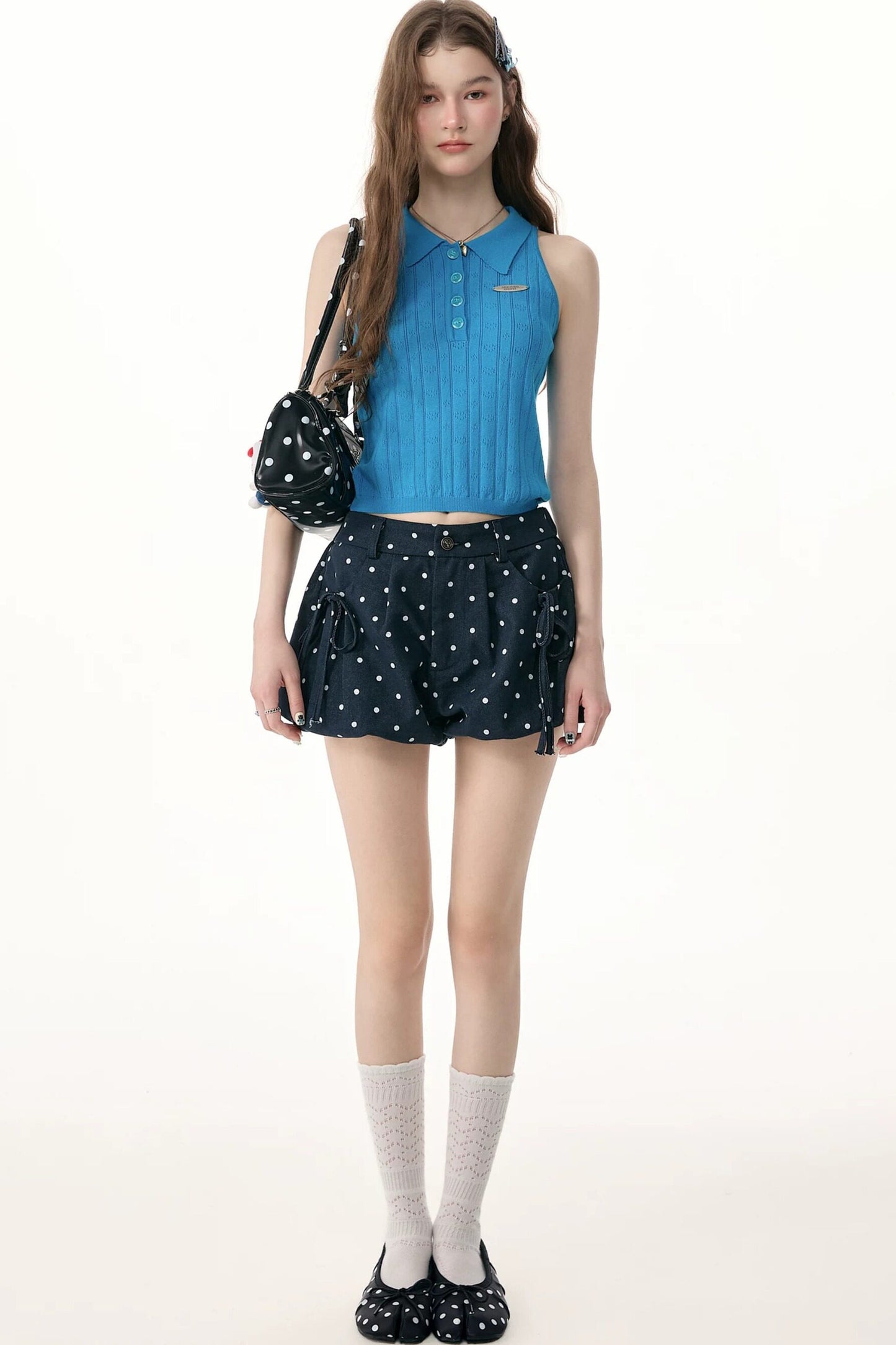 Dunkelblaue gepunktete Shorts mit hoher Taille
