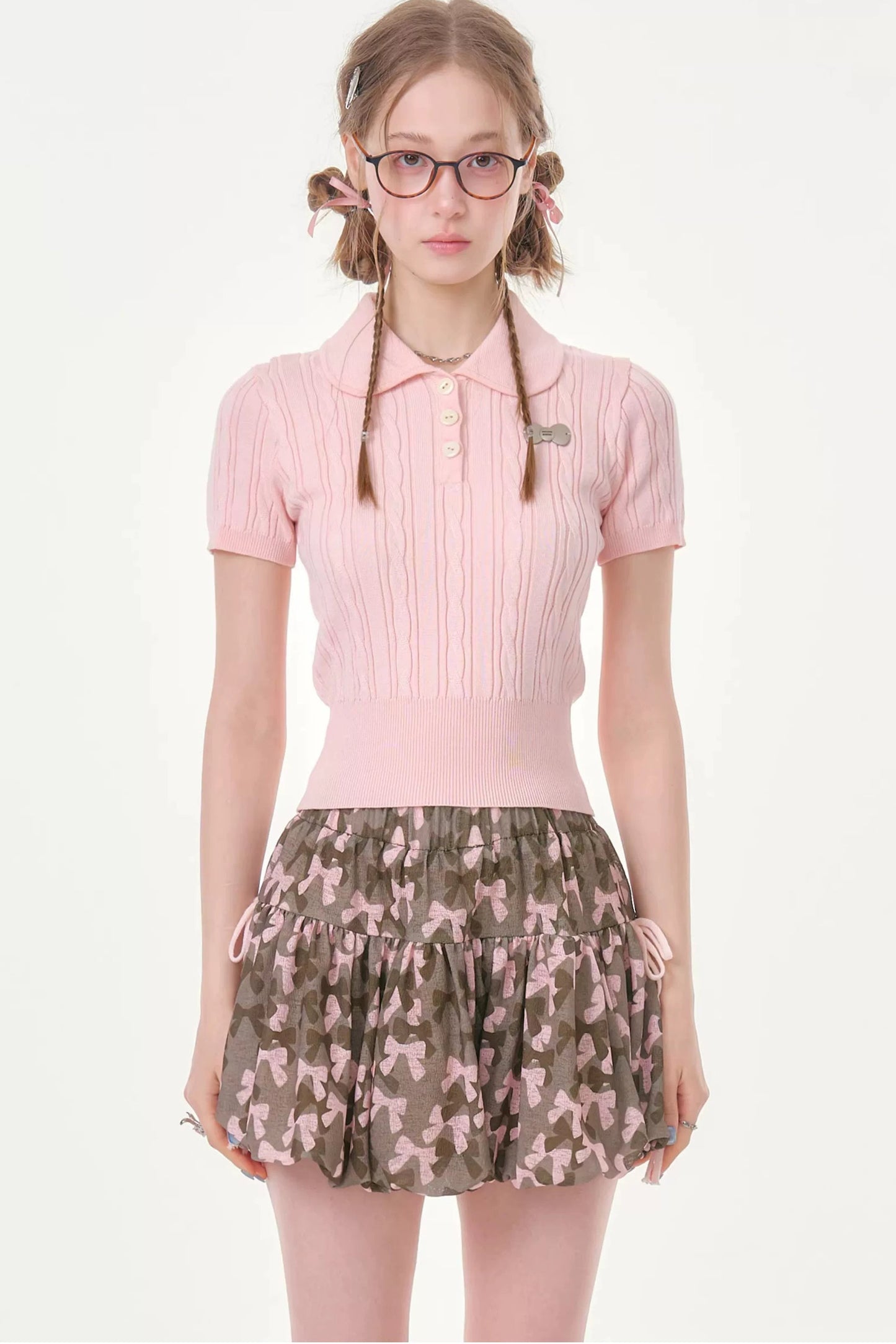Tee-shirt en maille rose à douce torsade