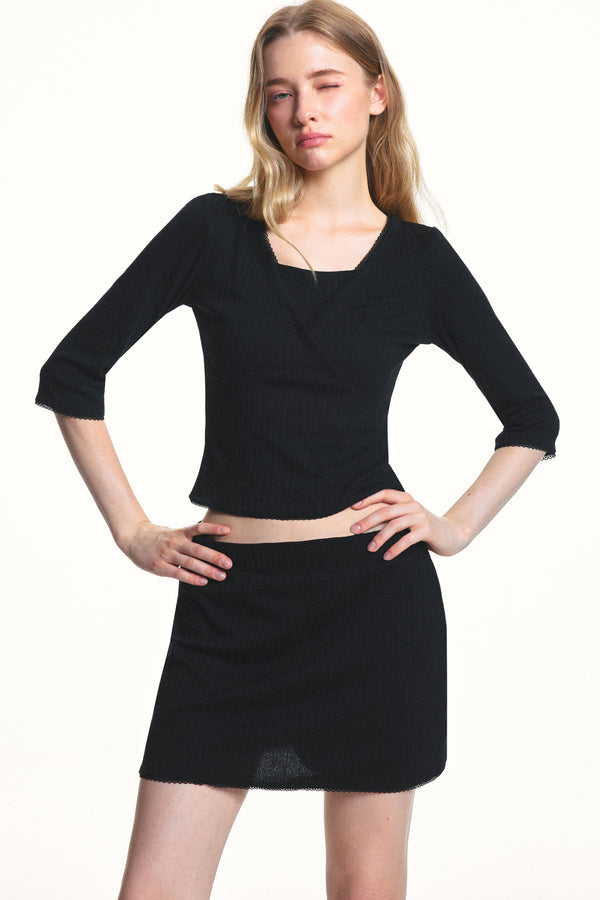Conjunto de top de punto jacquard texturizado y falda