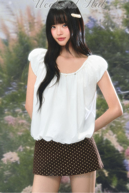 Blusa babydoll retro de mangas abullonadas
