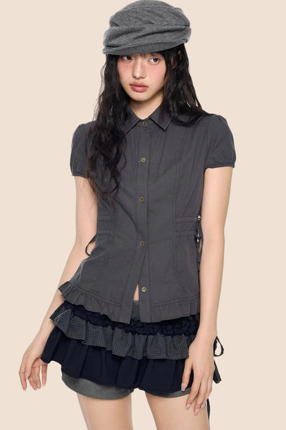 Blouse à manches bouffantes avec lacets