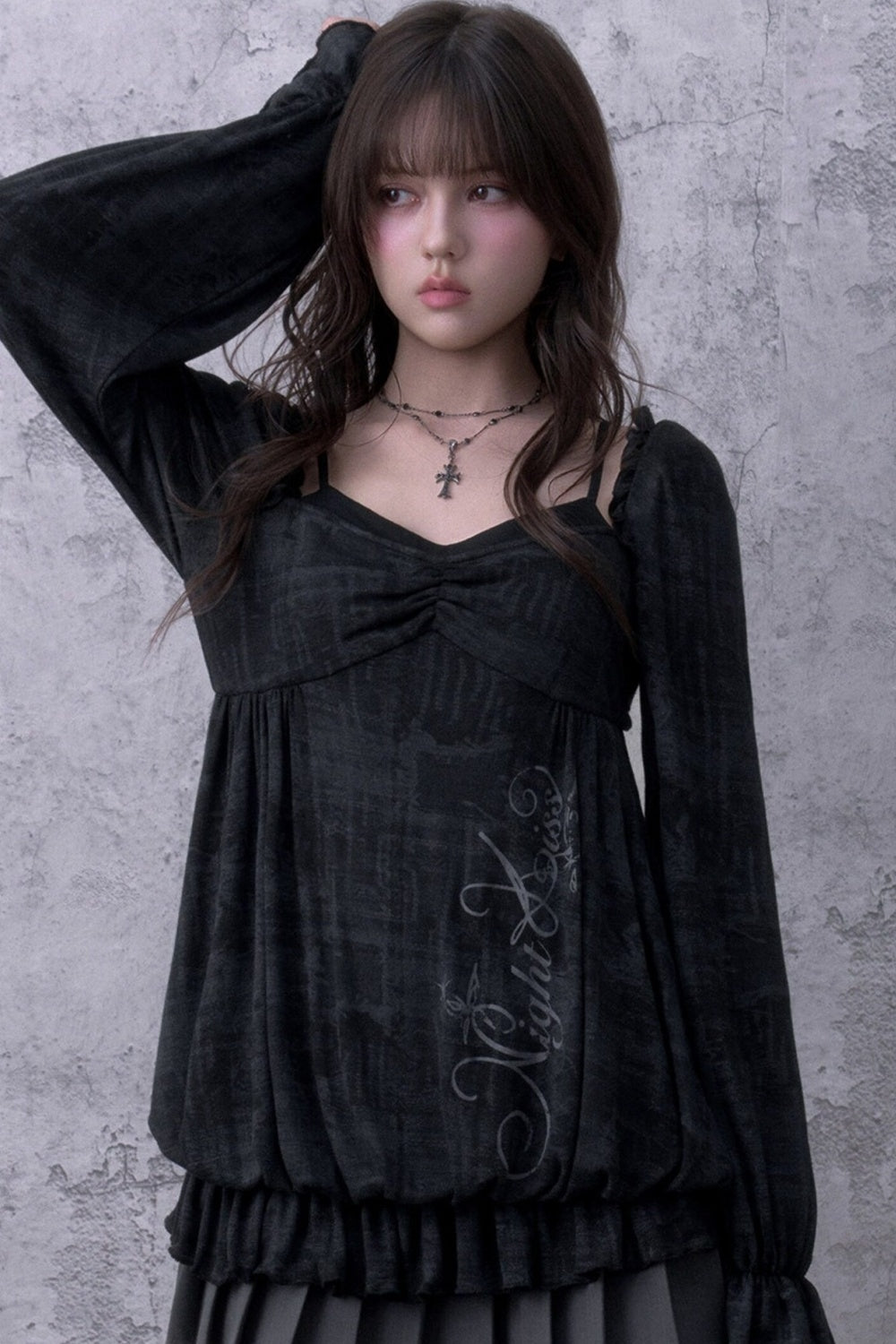 Schwarze Bluse in Lagenoptik mit Blumenmuster
