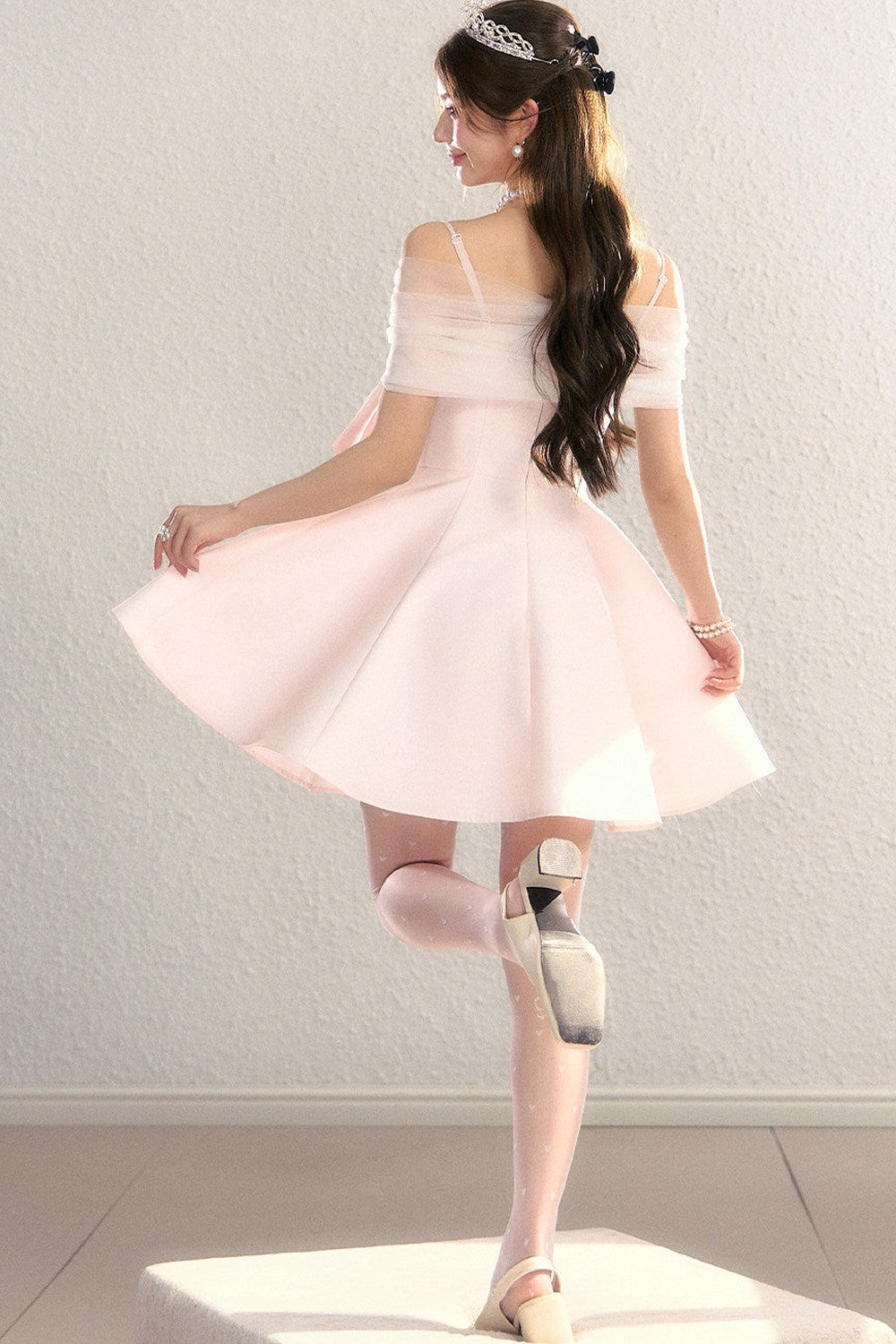 Abito da sera in tulle con spalle scoperte