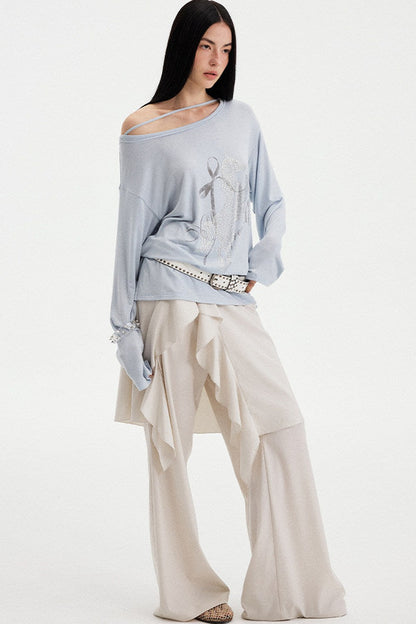 Top con strass effetto distressed con spalle scoperte