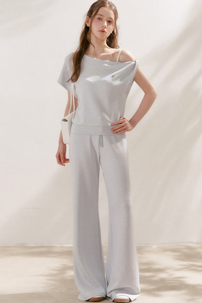 Conjunto de camiseta asimétrica y pantalones de capa de aire