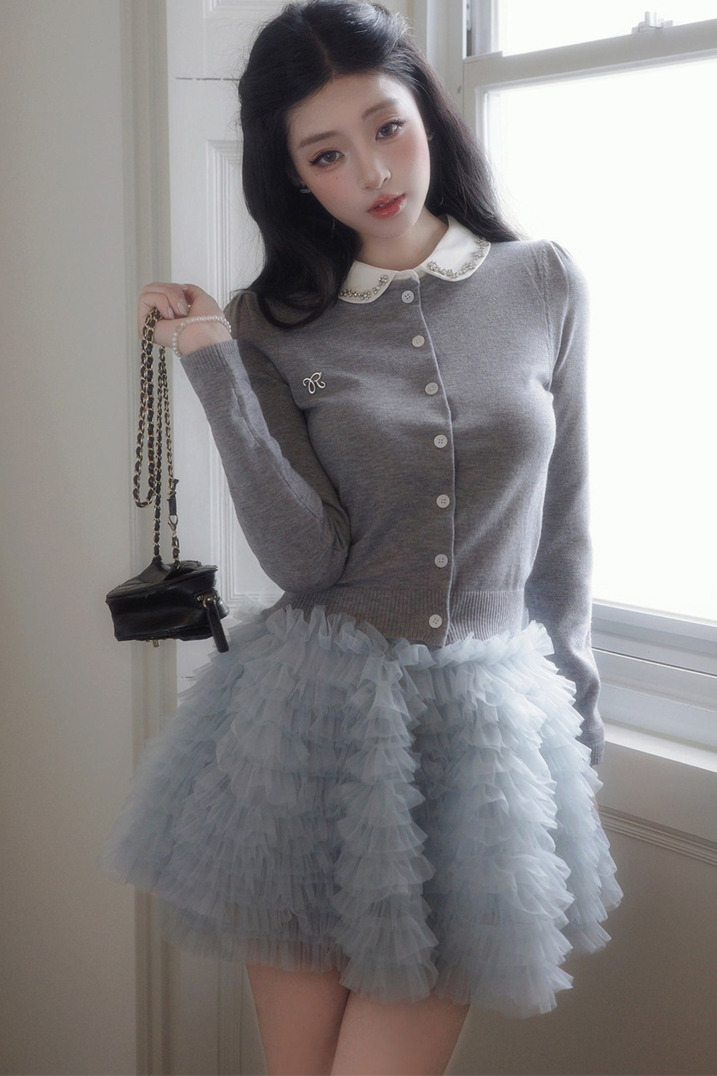 Strickjacke mit Bubikragen und Stufenrock-Set