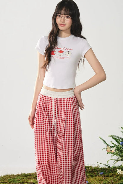 Camiseta de estilo americano con estampado de manzana