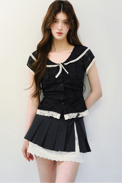 Blusa retrò blu navy a pois