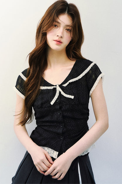 Blusa retrò blu navy a pois