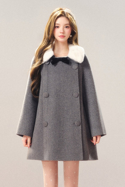 Manteau en laine avec nœud en velours