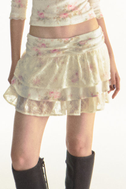 Top de punto floral con escote cuadrado y falda de volantes