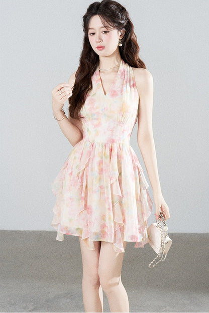 Abito a volant con scollo a V e allacciatura al collo in chiffon floreale
