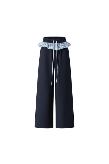 Ensemble haut tube rayé à épaules dénudées et manches longues avec pantalon à jambes larges