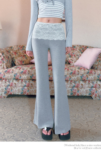 Pantaloni svasati a vita bassa grigi con inserti in pizzo