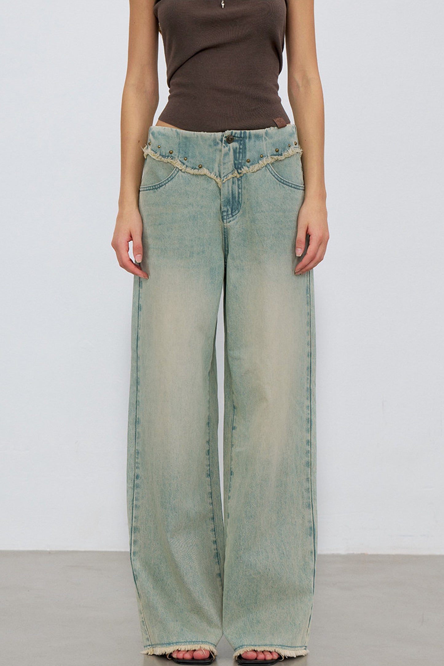 V-Shaped Raw Edge Rivet Denim Pants