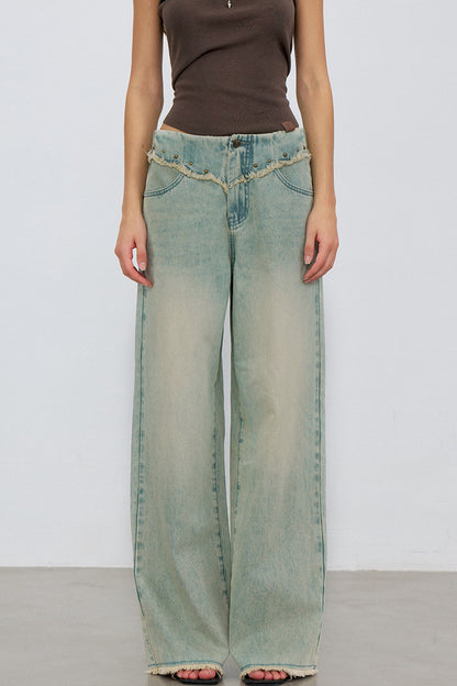 V-Shaped Raw Edge Rivet Denim Pants