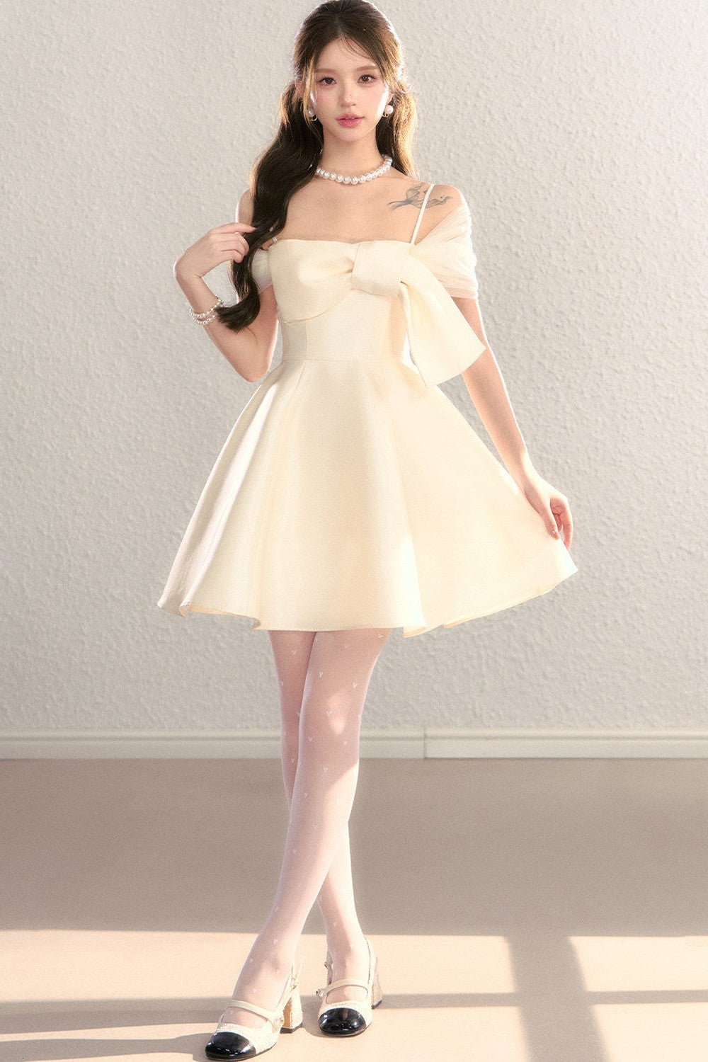 Abito da sera in tulle con spalle scoperte