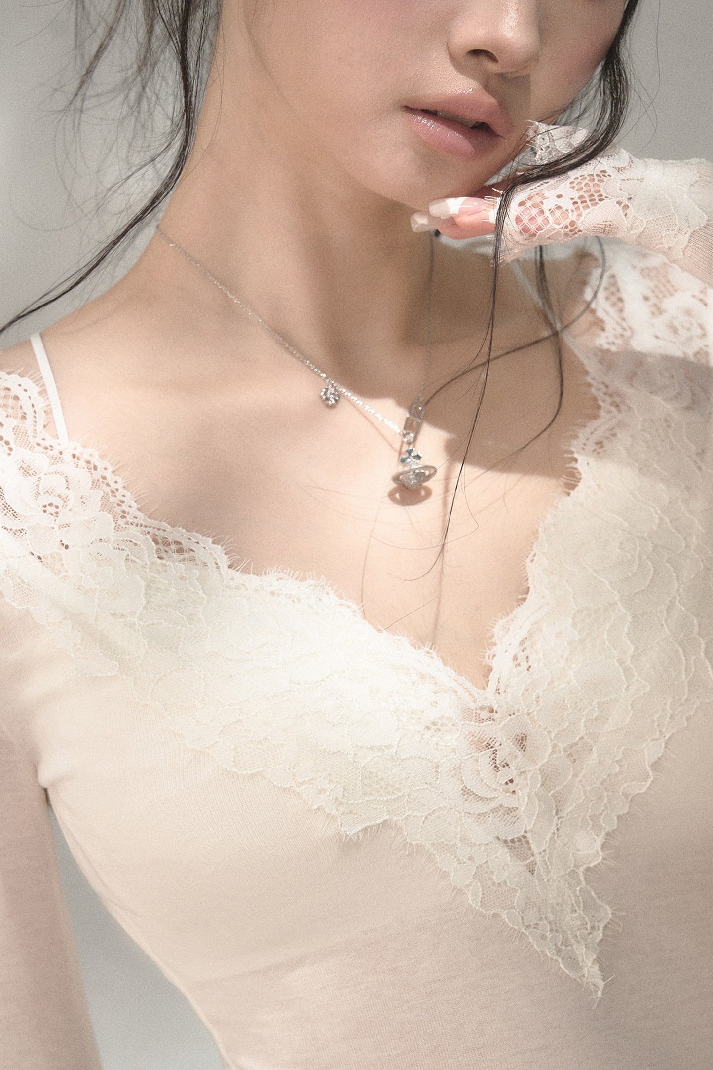 Top in maglia di pizzo a toppe