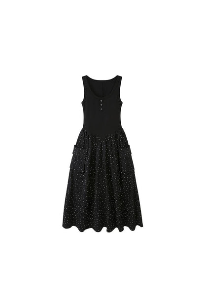 Vestido maxi evasé sin mangas de lunares