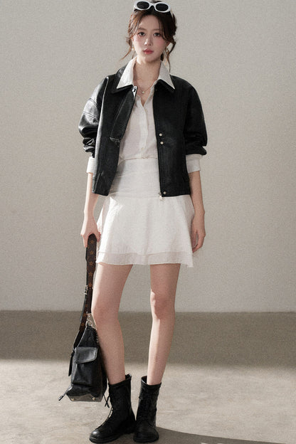 Giacca corta in pelle PU con revers