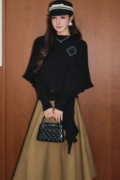 Ensemble pull et jupe noirs à bordure en dentelle