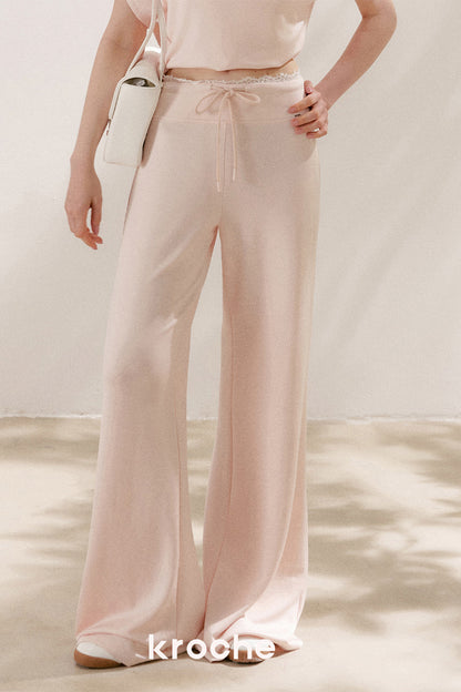 Conjunto de camiseta asimétrica y pantalones de capa de aire