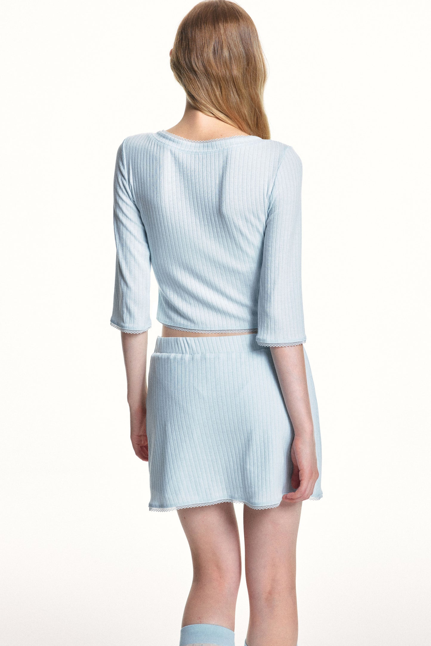 Conjunto de top de punto jacquard texturizado y falda