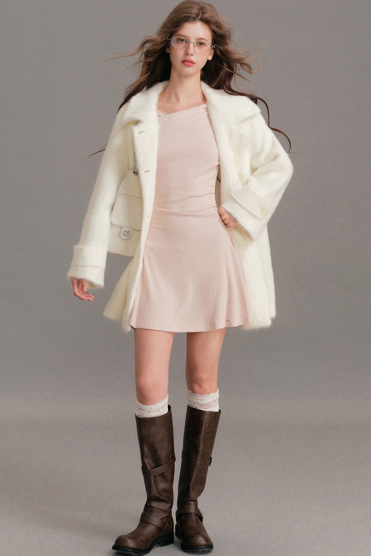 Manteau mi-long en laine imitation vison à épaules tombantes
