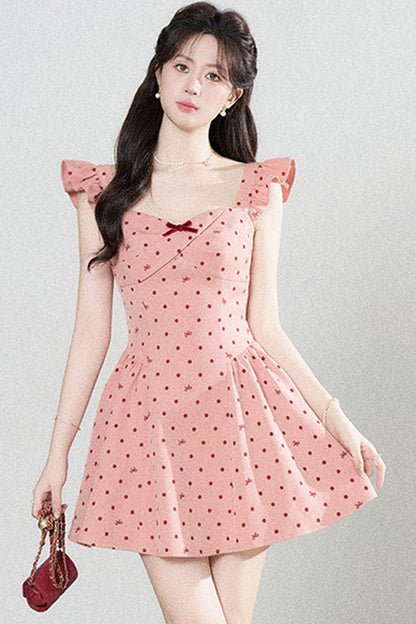 Rosafarbenes Kleid mit Punkten