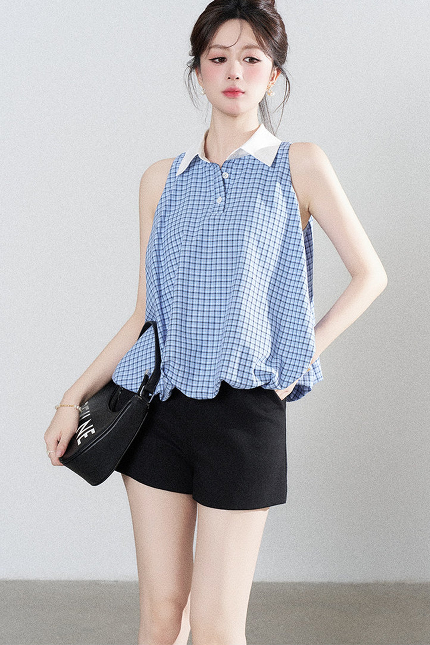 Blaue karierte Halter-Bluse