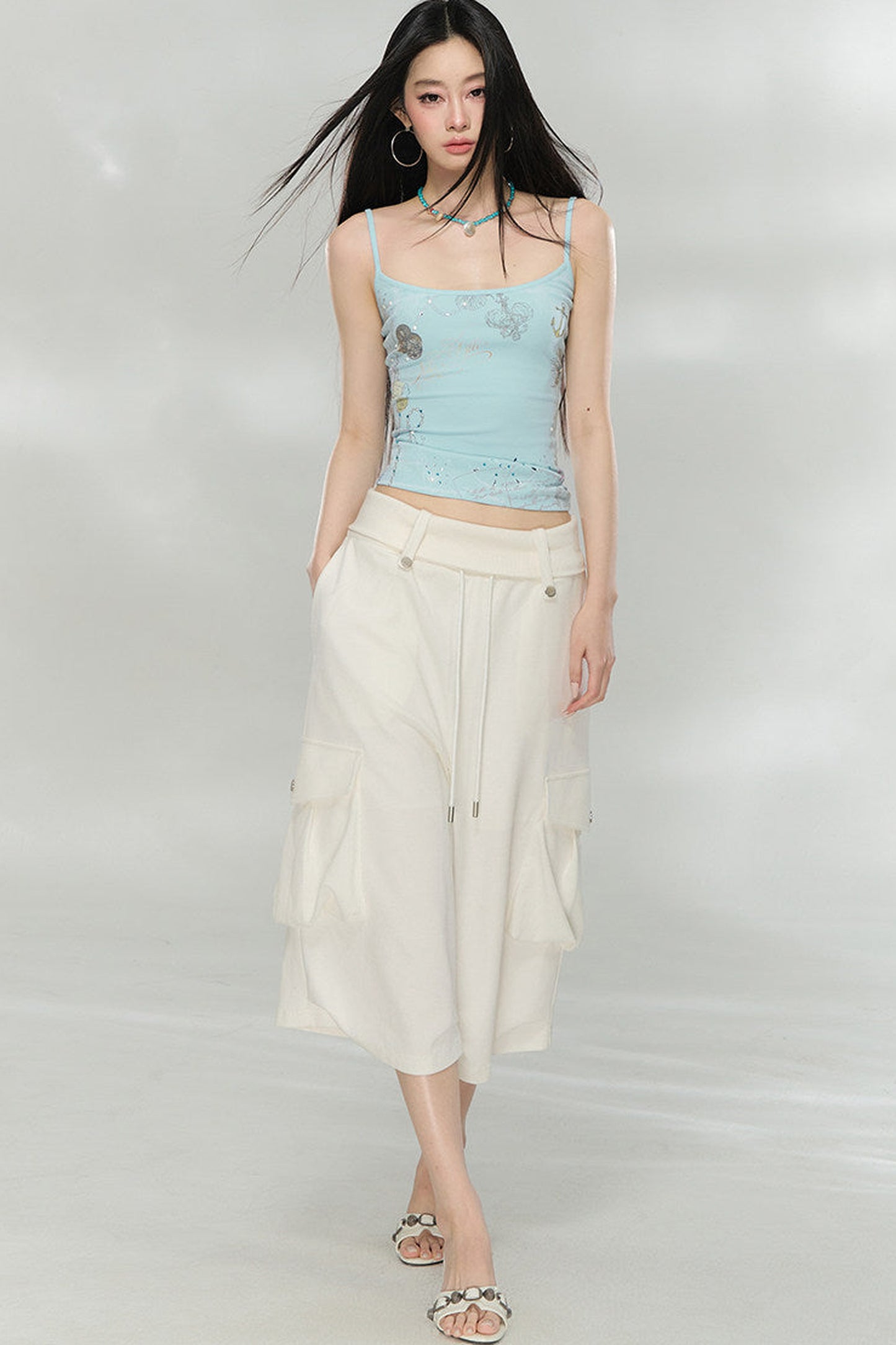 Camisola con estampado de pedrería