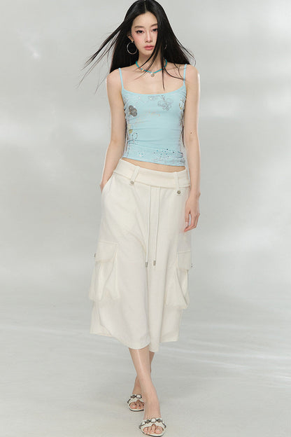 Camisola con estampado de pedrería
