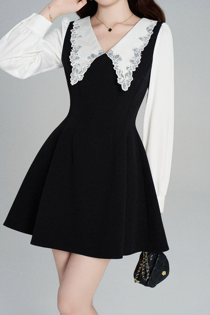 Schwarzes A-Linien-Kleid mit Bubikragen und tailliertem Schnitt