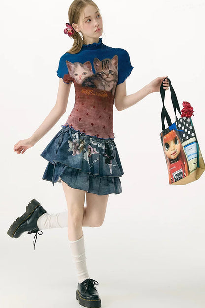 Blusa a blocchi di colore con stampa di gatti