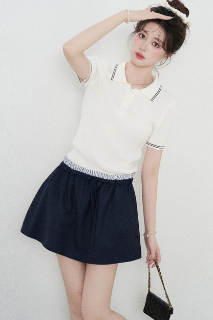 Ensemble tee-shirt polo en tricot blanc à manches courtes et jupe