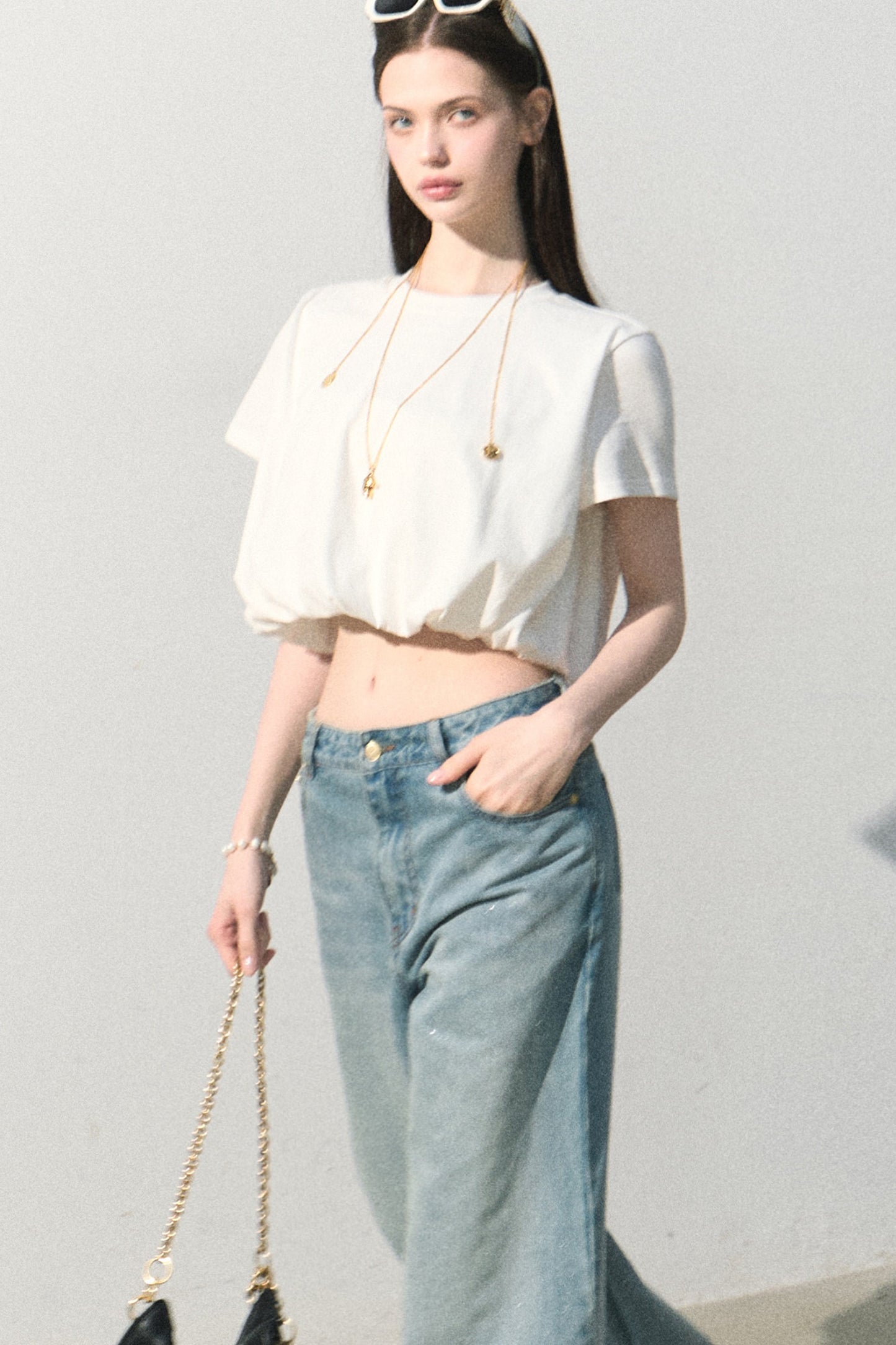 Blusa in lino plissettata a bocciolo