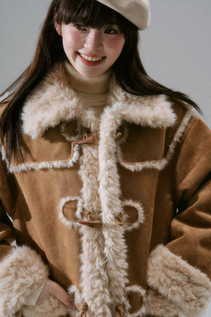 Manteau long à boutons en corne