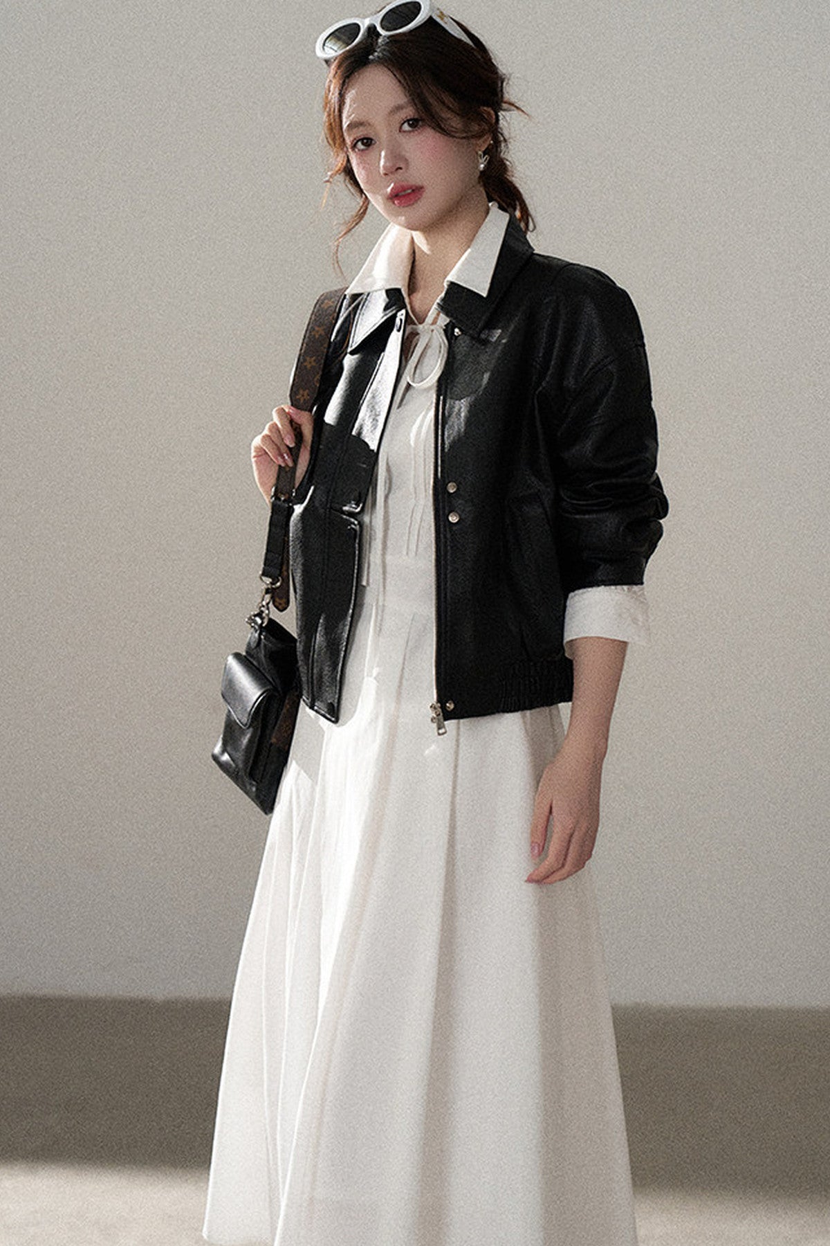 Giacca corta in pelle PU con revers