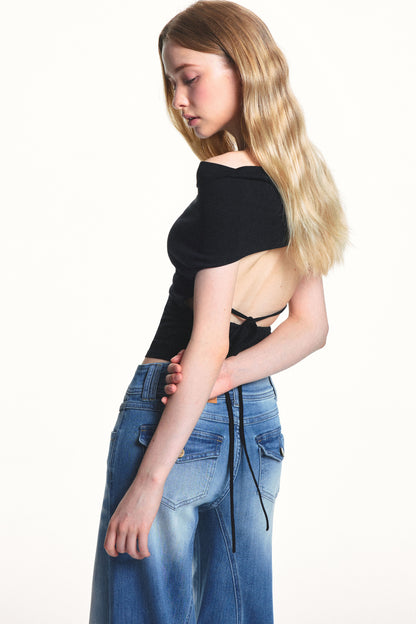 Maglia a righe con spalle scoperte