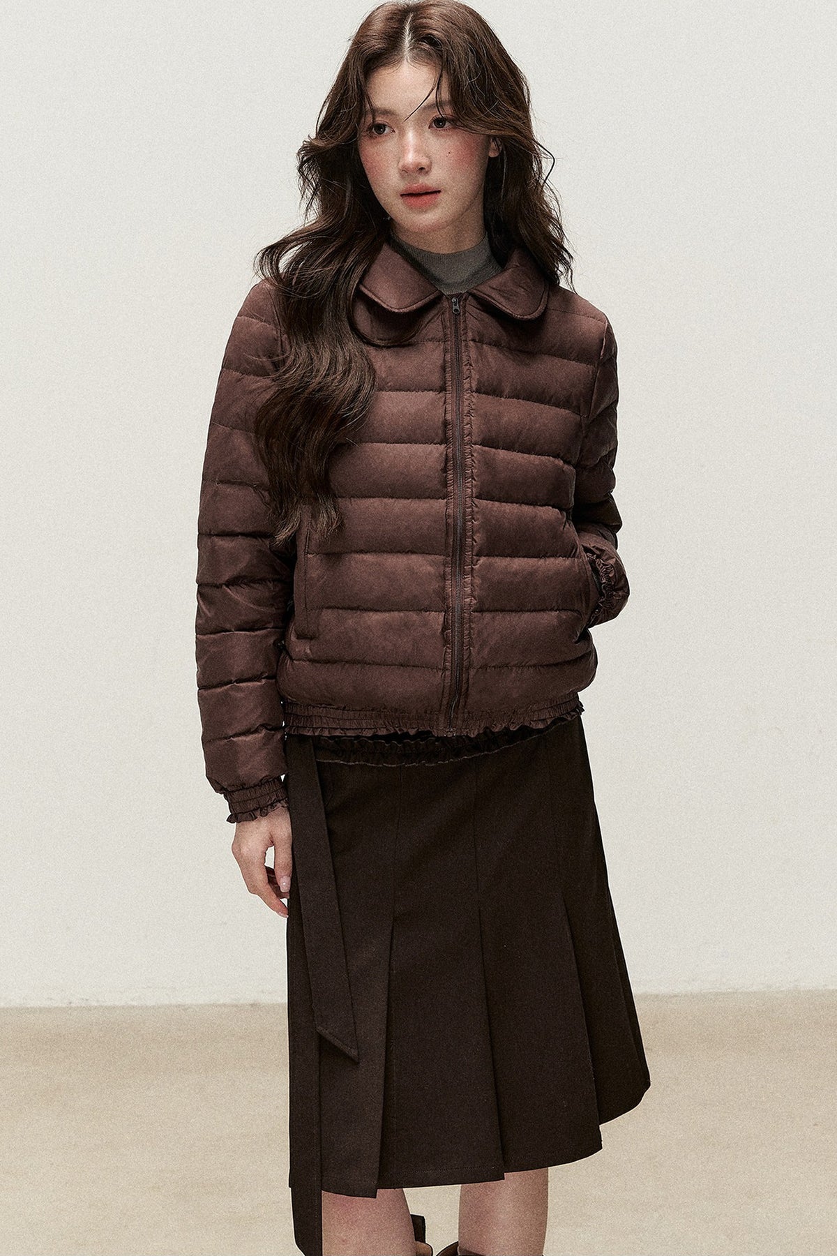 Wendbare Daunenjacke aus Cord mit Bubikragen