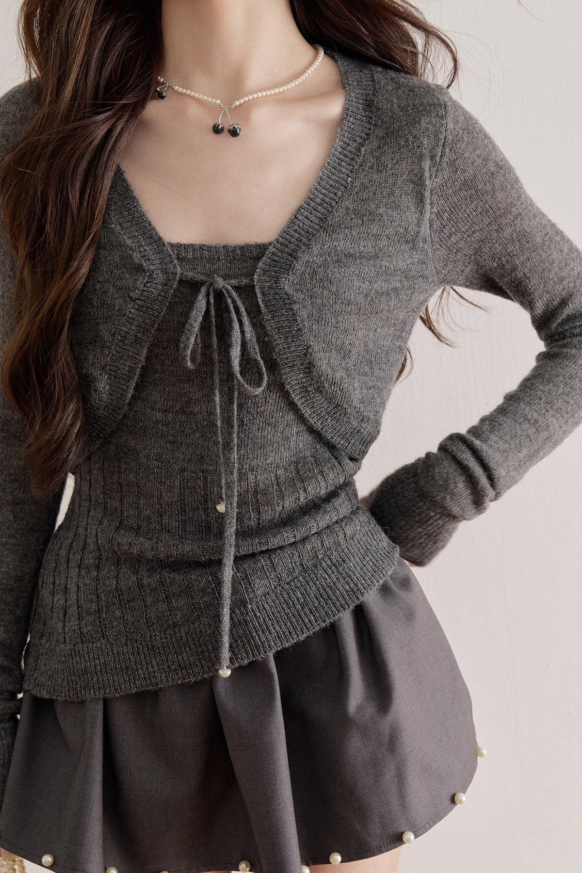 Long-Sleeve V-Neck Lace-Up Knit Sweater