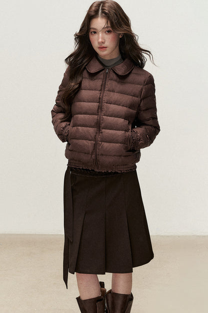 Wendbare Daunenjacke aus Cord mit Bubikragen