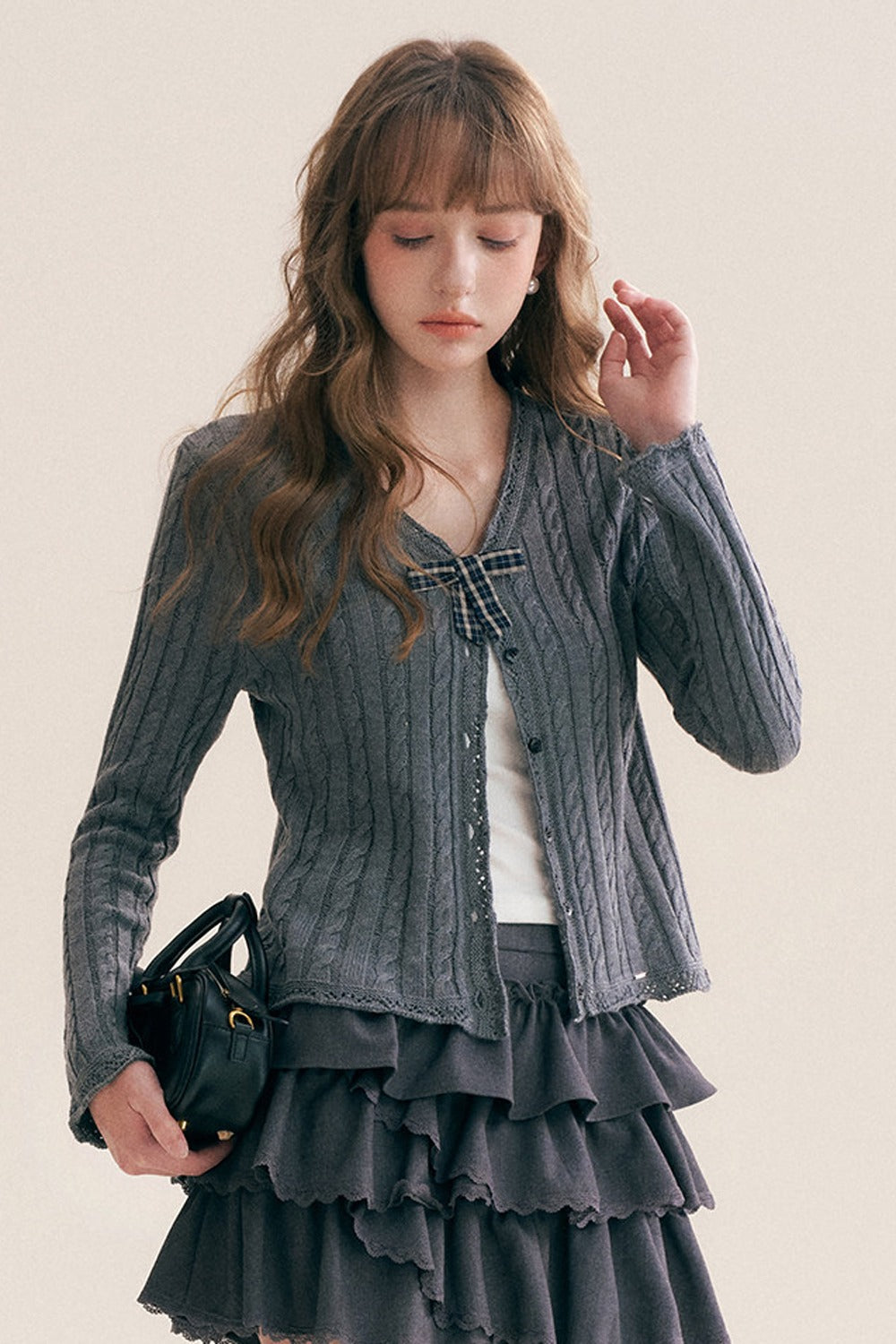 Cardigan à col en V à carreaux avec nœud