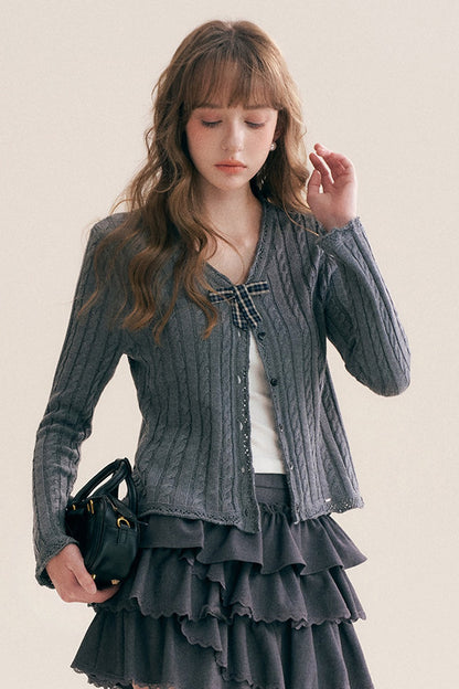 Cardigan à col en V à carreaux avec nœud