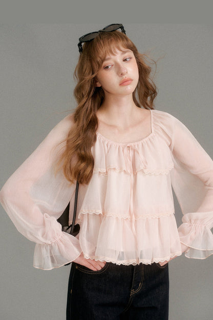 Blouse en mousseline à col carré et volants